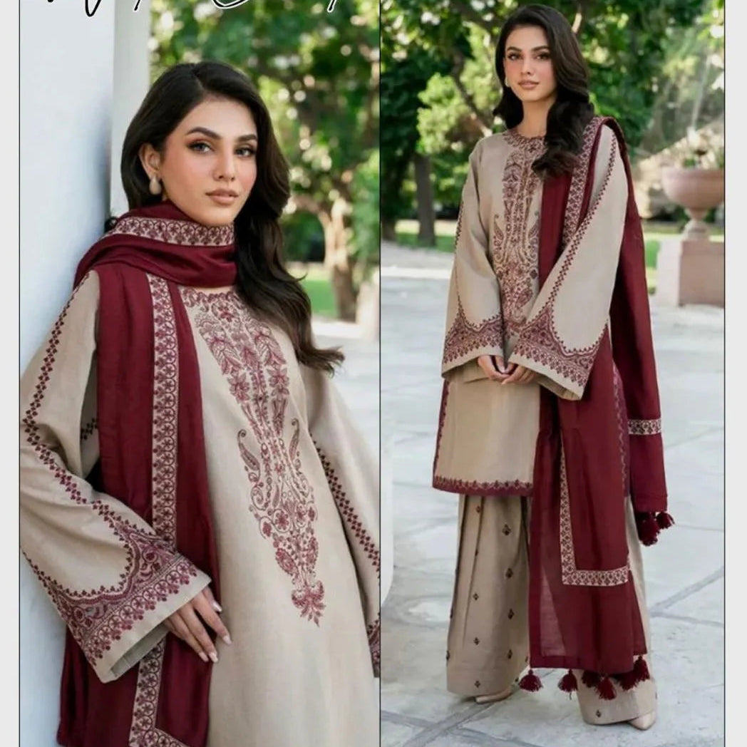 Woman wearing a Baroque winter collection outfit with maroon and beige traditional attire.