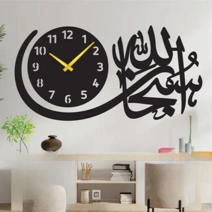 Wall clock with Arabic calligraphy on a wall in a room with a desk and plants.
